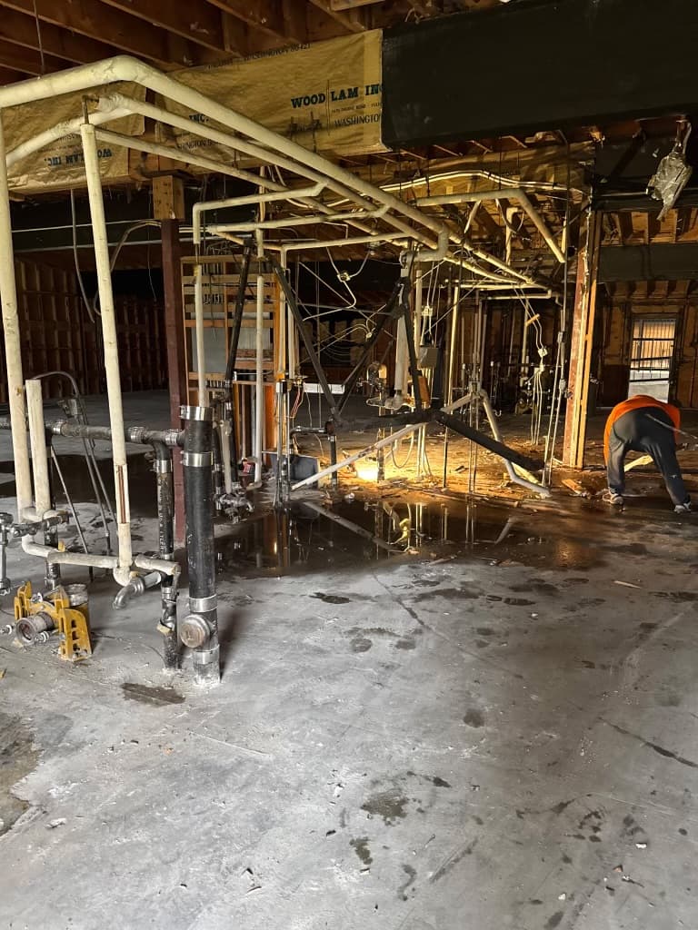 Commercial plumbing rough-in at an active All County Plumbing project