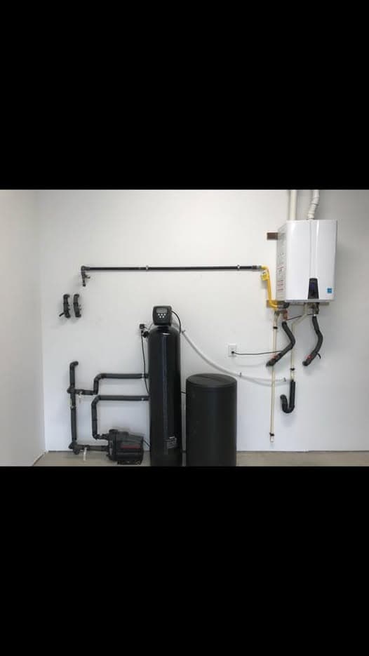 Tankless water heater and filtration installed by All County Plumbing
